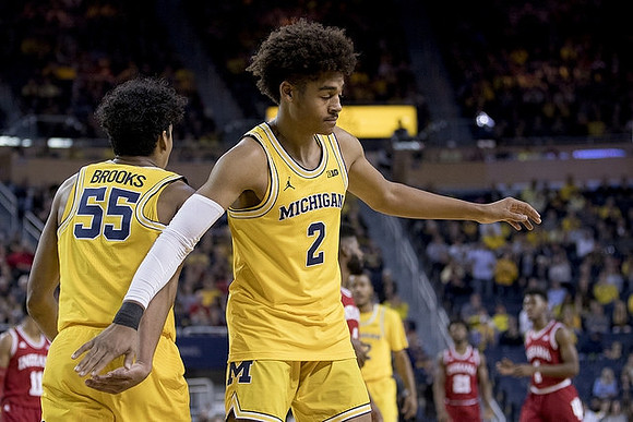 Jordan Poole (2), Eli Brooks (55), and Muhammad-Ali Abdur-Rahkman (12)