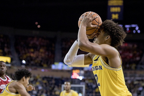 Jordan Poole (2), Eli Brooks (55), and Muhammad-Ali Abdur-Rahkman (12)