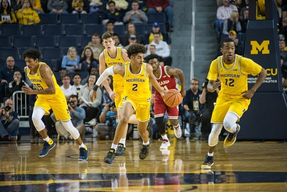 Eli Brooks (55), Jon Teske (15), Jordan Poole (2), and Muhammad-Ali Abdur-Rahkman (12)