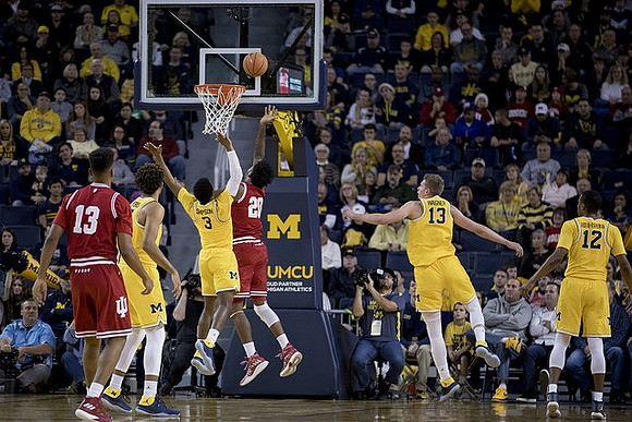 Isaiah Livers (4), Zavier Simpson (3), Muhammad-Ali Abdur-Rahkman (12), and Muhammad-Ali Abdur-Rahkman (12)