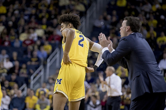 Jordan Poole (2) and Indiana Head Coach Archie Miller