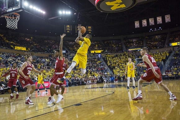 Muhammad-Ali Abdur-Rahkman (12), Moritz Wagner (13), and Zavier Simpson (3)