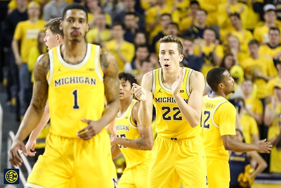 Charles Matthews (1), Eli Brooks (55), Duncan Robinson (22), and Muhammad-Ali Abdur-Rahkman (12)
