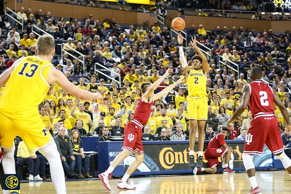 Jordan Poole (2) and Moritz Wagner (13)