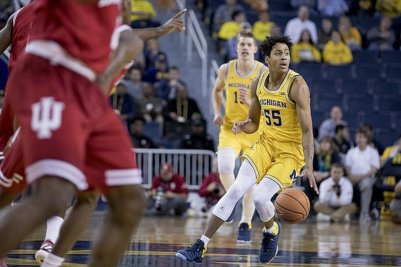 Moritz Wagner (13) and Eli Brooks (55)