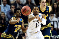 Derrick Walton Jr. (10) and Mark Donnal (34)