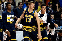 Kameron Chatman (3), Moritz Wagner (13), and D.J. Wilson (5)