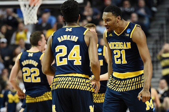 Duncan Robinson (22), Aubrey Dawkins (24), and Zak Irvin (21)