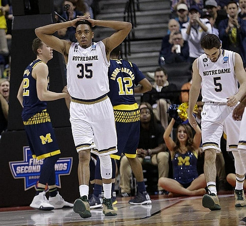 Duncan Robinson (22) and Muhammad-Ali Abdur-Rahkman (12)