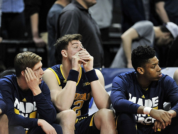 Spike Albrecht (2), Ricky Doyle (32), and Kameron Chatman (3)