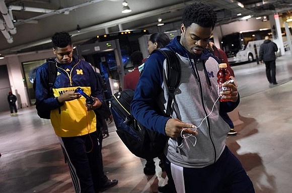 Kameron Chatman (3) and Derrick Walton Jr. (10)