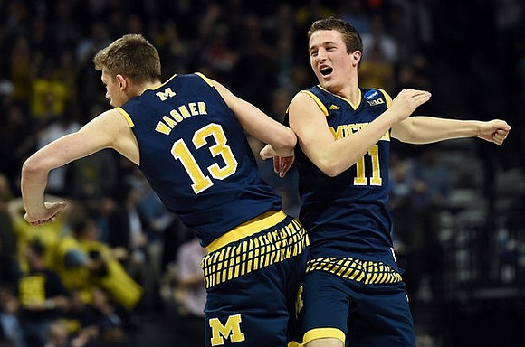 Moritz Wagner (13) and Andrew Dakich (11)
