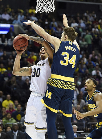 Mark Donnal (34) and Zak Irvin (21)