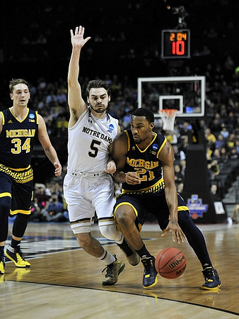 Mark Donnal (34) and Zak Irvin (21)