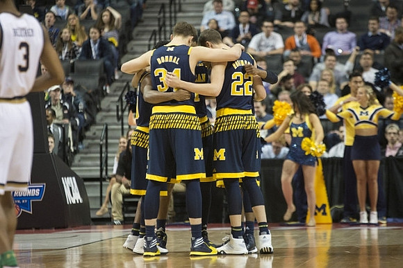 Mark Donnal (34) and Duncan Robinson (22)