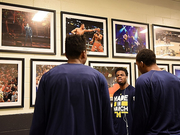 Kameron Chatman (3), Derrick Walton Jr. (10), and Zak Irvin (21)
