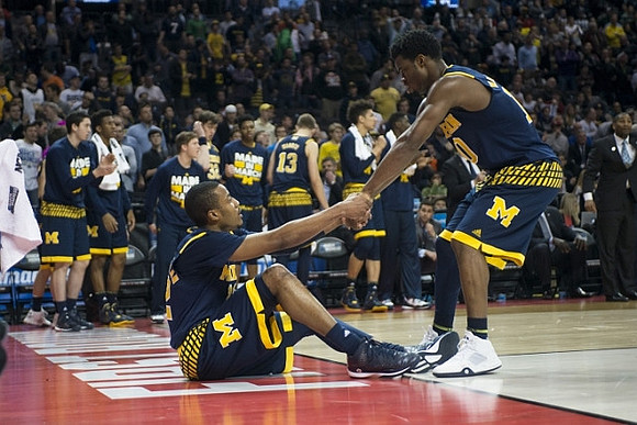 Muhammad-Ali Abdur-Rahkman (12) and Derrick Walton Jr. (10)