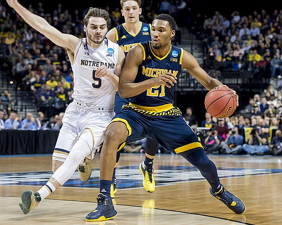 Mark Donnal (34) and Zak Irvin (21)