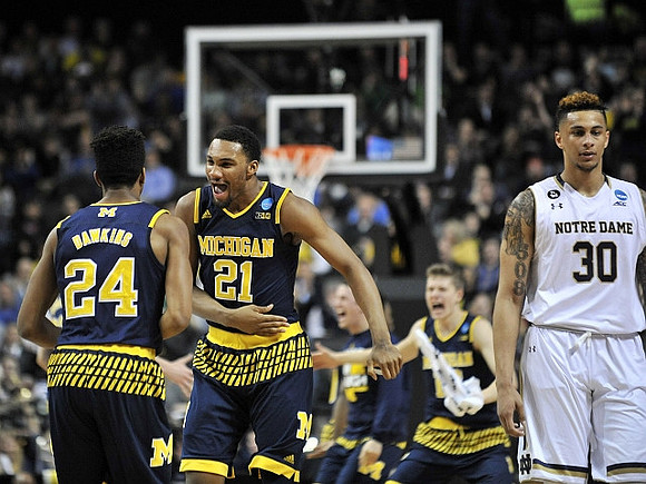 Aubrey Dawkins (24) and Zak Irvin (21)