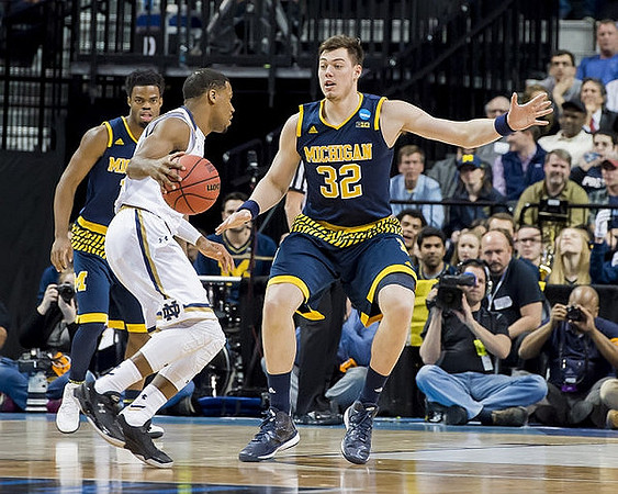 Derrick Walton Jr. (10) and Ricky Doyle (32)