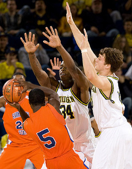 DeShawn Sims (34) and Zack Novak (0)