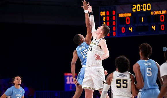 Jon Teske (15) and Eli Brooks (55)