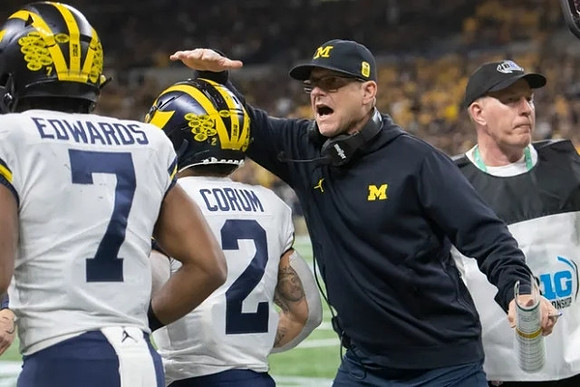 Donovan Edwards (7), Blake Corum (2), and Jim Harbaugh
