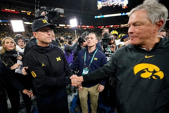 Jim Harbaugh and Iowa Head Coach Kirk Ferentz