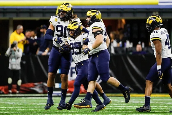 Mike Morris (90), Junior Colson (25), Joey George (57), and Nikhai Hill-Green (41)