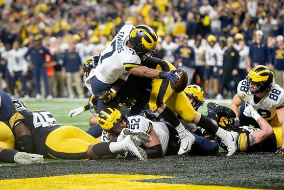 Karsen Barnhart (52), Donovan Edwards (7), and Matthew Hibner (88)