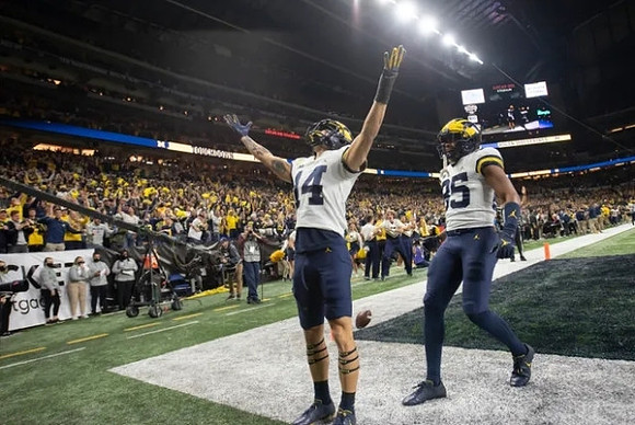 Roman Wilson (14) and Daylen Baldwin (85)