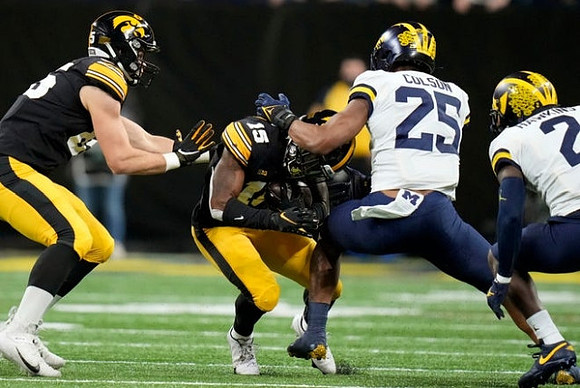 Junior Colson (25) and Brad Hawkins (2)