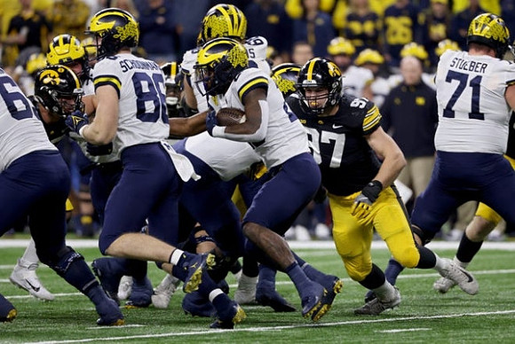 Zak Zinter (65), Luke Schoonmaker (86), Hassan Haskins (25), Andrew Vastardis (68), and Andrew Stueber (71)