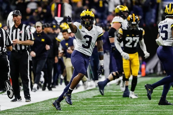 A.J. Henning (3) and Junior Colson (25)