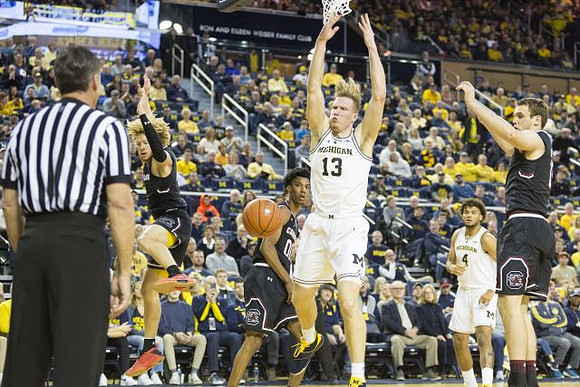 Ignas Brazdeikis (13) and Isaiah Livers (4)
