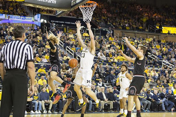 Ignas Brazdeikis (13) and Isaiah Livers (4)