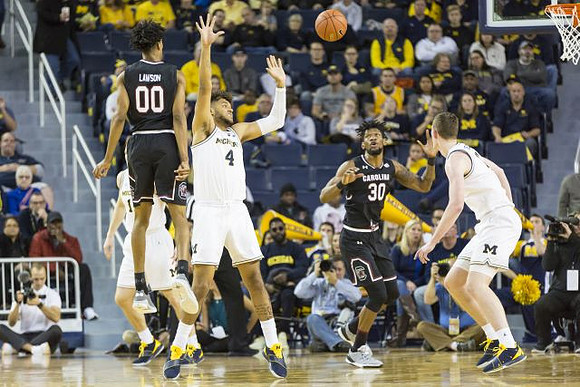 Ignas Brazdeikis (13), Isaiah Livers (4), and Jon Teske (15)