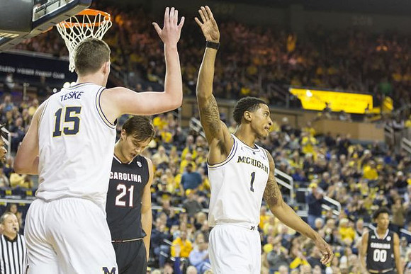 Jon Teske (15) and Charles Matthews (1)