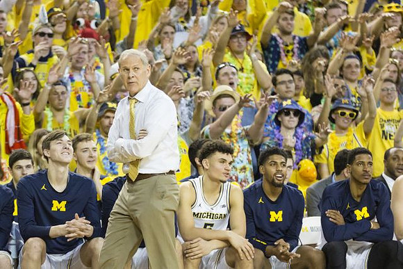 Colin Castleton (11), John Beilein, Adrien Nunez (5), David DeJulius (0), and Charles Matthews (1)