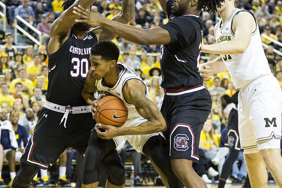 Charles Matthews (1) and Austin Davis (51)