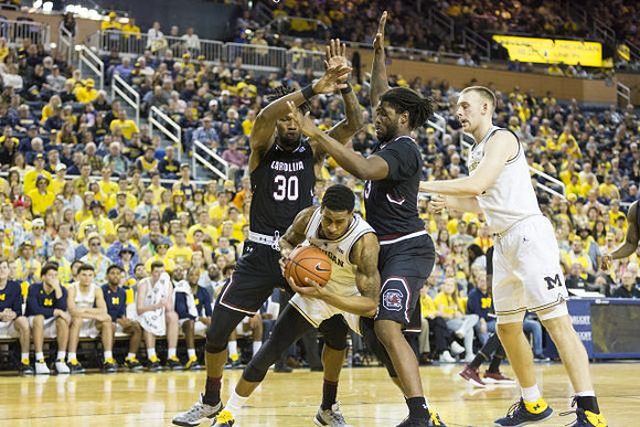 Charles Matthews (1) and Austin Davis (51)