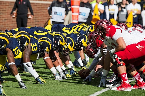 James Ross (15), Taco Charlton (33), Mario Ojemudia (53), and Joe Bolden (35)