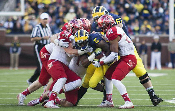 Justice Hayes (5) and Kyle Kalis (67)