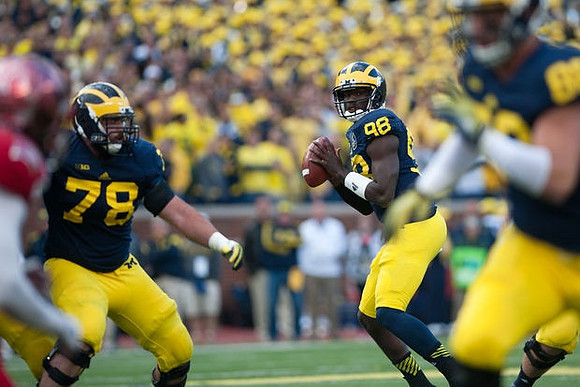 Erik Magnuson (78) and Devin Gardner (98)