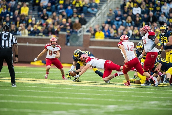 Wyatt Shallman (33), Brennen Beyer (97), and Sione Houma (39)