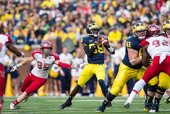 Devin Gardner (98) and Graham Glasgow (61)