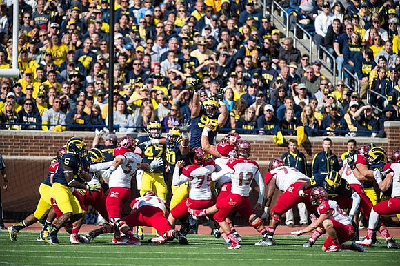 Jabrill Peppers (5), Jake Ryan (47), Matthew Godin (99), and Mario Ojemudia (53)