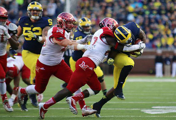 Mason Cole (52) and Justice Hayes (5)