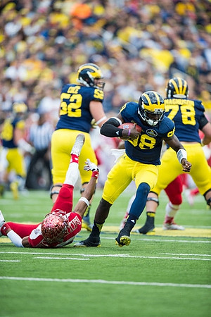 Mason Cole (52), Devin Gardner (98), and Erik Magnuson (78)