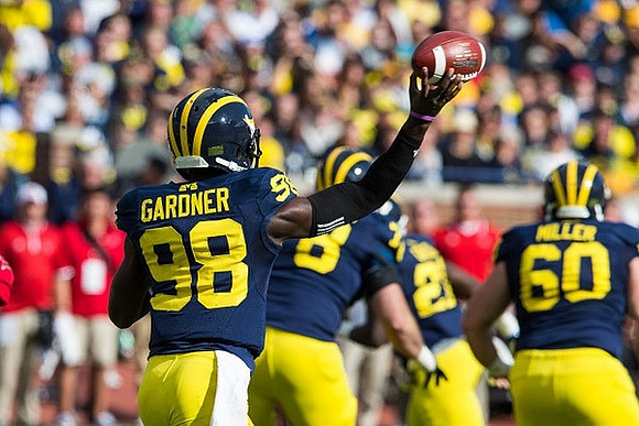 Devin Gardner (98) and Jack Miller (60)
